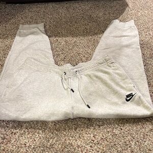 Nike Gray Track Pants with Elastic Cuffs and Relaxed Fit